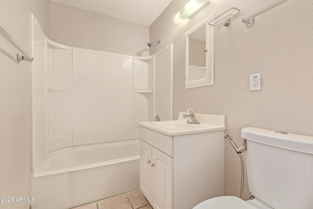 bathroom with a textured wall, tile patterned flooring, toilet, shower / bath combination, and vanity