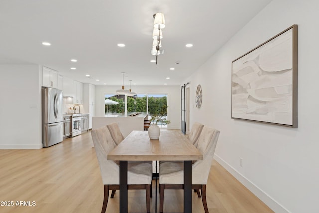 8403 E Fairmount Ave, Scottsdale, AZ 85251 - dining space with light wood-type flooring, recessed lighting, and baseboards