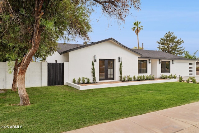 8403 E Fairmount Ave, Scottsdale, AZ 85251 - view of front facade featuring french doors, a shingled roof, stucco siding, and a garage