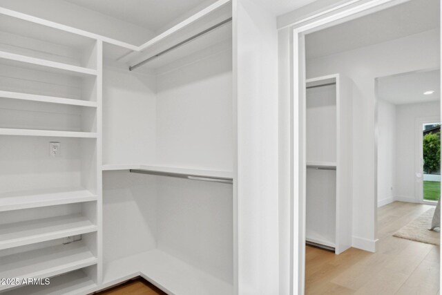 8403 E Fairmount Ave, Scottsdale, AZ 85251 - spacious closet with wood finished floors