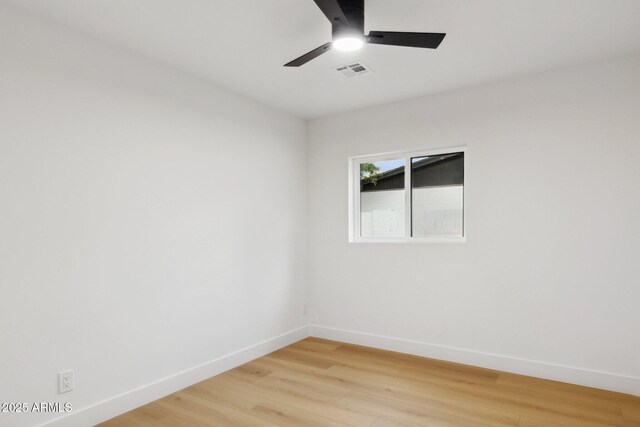 8403 E Fairmount Ave, Scottsdale, AZ 85251 - empty room with baseboards, ceiling fan, and light wood-style flooring