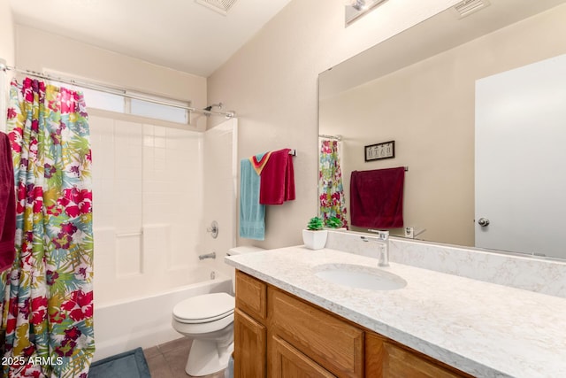 bathroom featuring visible vents, toilet, tile patterned floors, shower / bath combo with shower curtain, and vanity