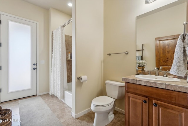 full bathroom with vanity, toilet, shower / tub combo, and tile patterned floors