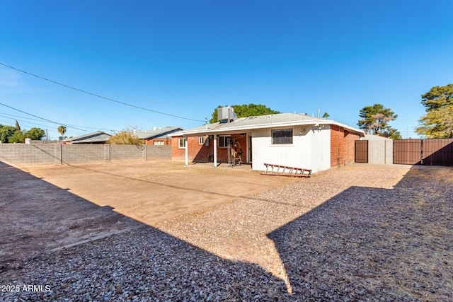 rear view of property with a patio area