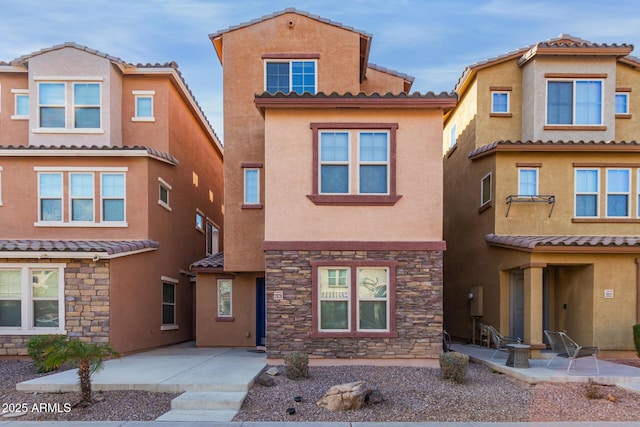 view of front of house with a patio area