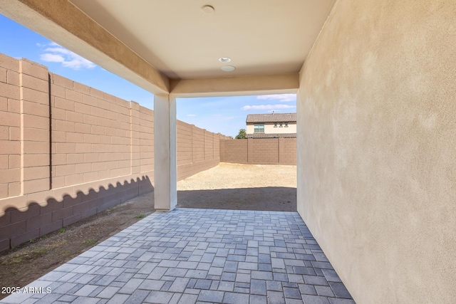 view of patio with a fenced backyard