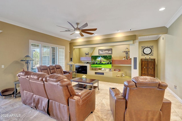 living room featuring ceiling fan and ornamental molding