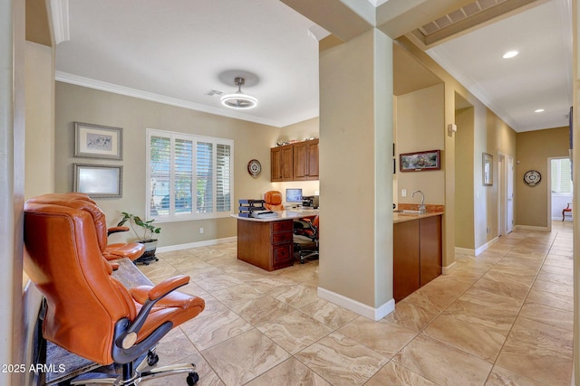 office space with sink and crown molding