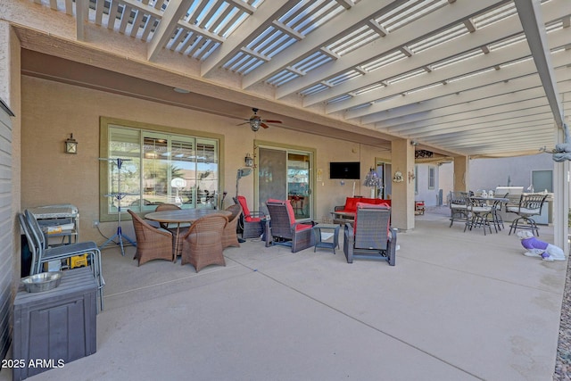 view of patio featuring ceiling fan, a pergola, and outdoor lounge area