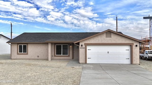 single story home featuring a garage