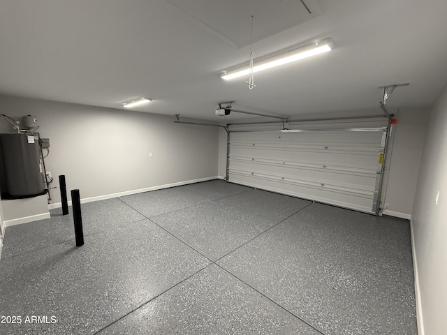 garage featuring a garage door opener and water heater