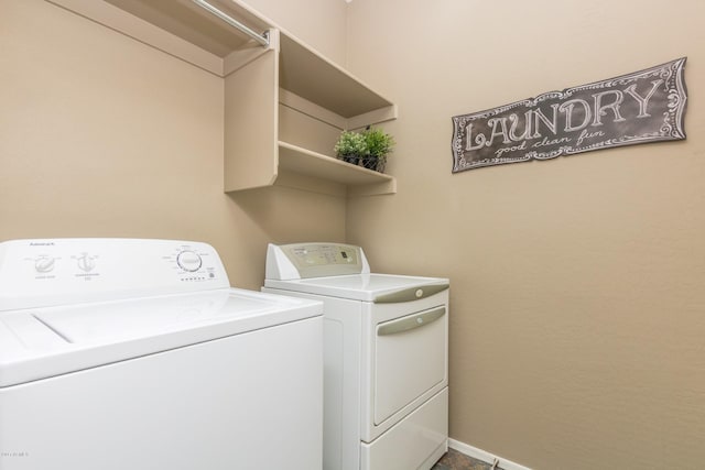 laundry area with washer and clothes dryer