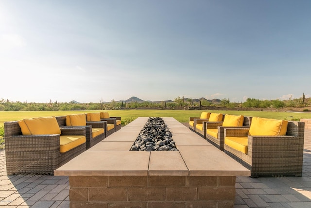 view of patio / terrace featuring a mountain view