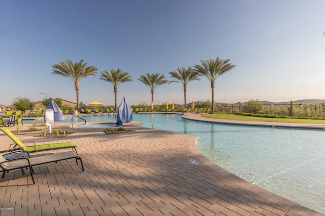 view of pool featuring a patio area