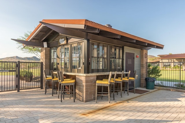 exterior space featuring exterior bar and a mountain view