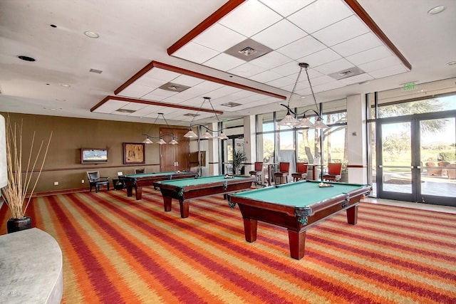 game room featuring french doors, carpet, and plenty of natural light