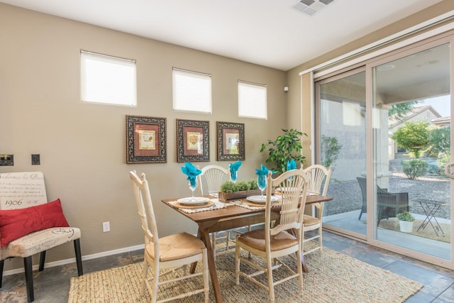 dining area with plenty of natural light