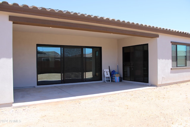 rear view of property with a patio