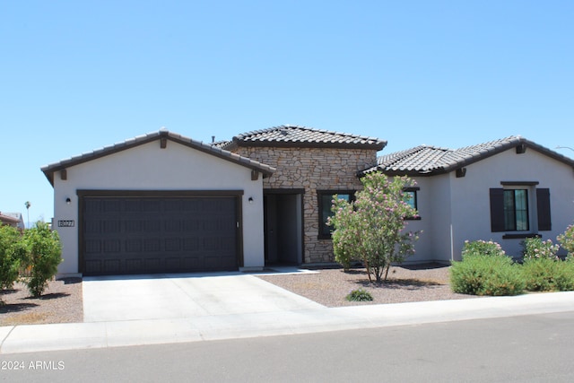 view of front of house with a garage