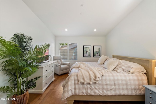 10239 E Salt Bush Dr, Scottsdale, AZ 85255 - bedroom with vaulted ceiling, recessed lighting, and wood finished floors