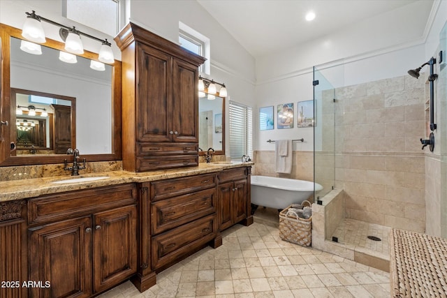 10239 E Salt Bush Dr, Scottsdale, AZ 85255 - full bath with double vanity, a freestanding tub, a tile shower, and a sink