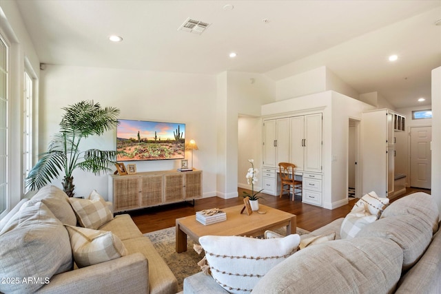 10239 E Salt Bush Dr, Scottsdale, AZ 85255 - living area with visible vents, wood finished floors, and vaulted ceiling