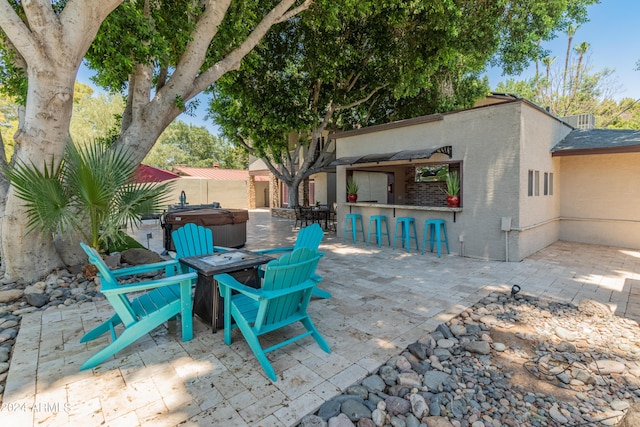 view of patio / terrace with an outdoor bar