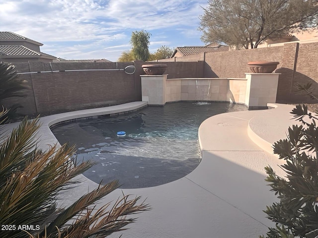 view of pool featuring pool water feature