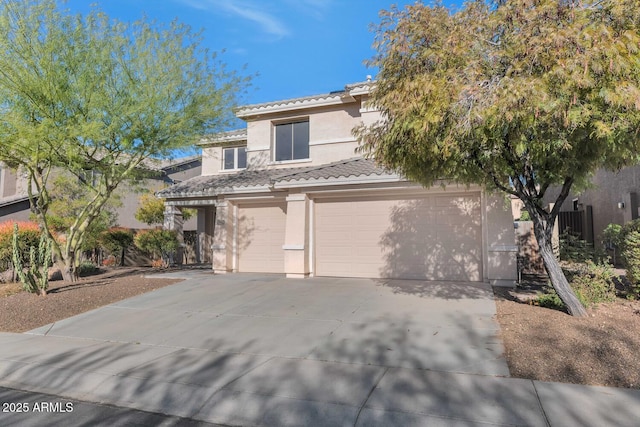 view of front of property with a garage