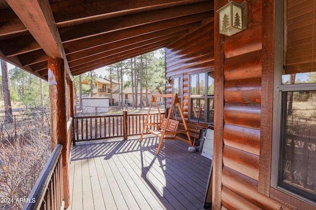 deck featuring covered porch