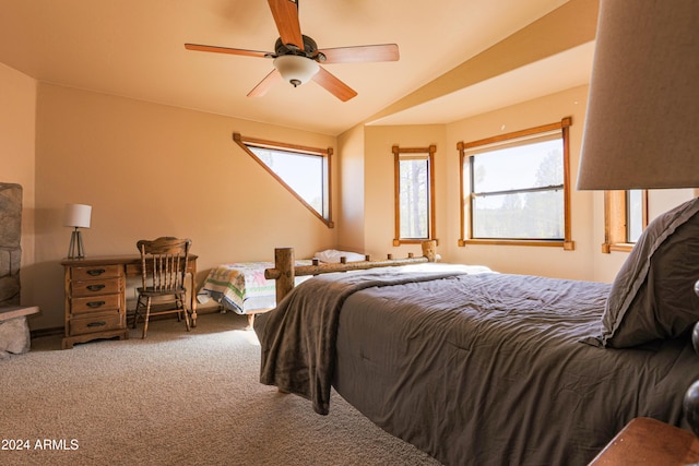 bedroom featuring ceiling fan, carpet floors, and lofted ceiling