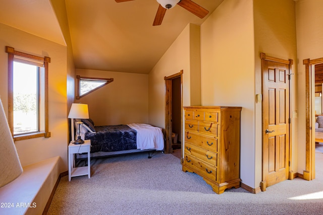 bedroom with carpet flooring, ceiling fan, and lofted ceiling