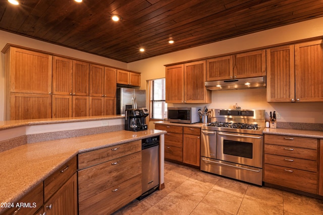 kitchen with light stone countertops, light tile patterned floors, stainless steel appliances, and wooden ceiling