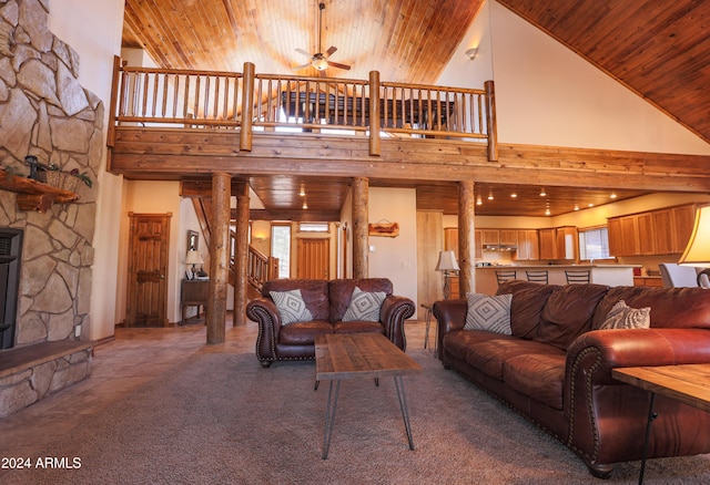 living room featuring high vaulted ceiling, ceiling fan, and wooden ceiling