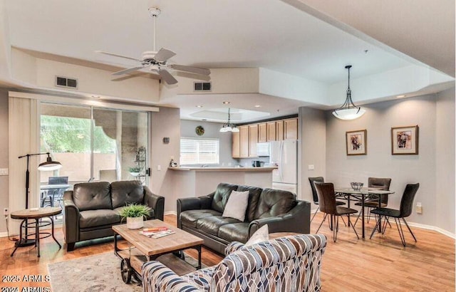 8245 E Bell Rd Unit 103, Scottsdale, AZ 85260 - living room with light wood-type flooring, baseboards, and ceiling fan