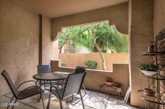 8245 E Bell Rd Unit 103, Scottsdale, AZ 85260 - balcony featuring outdoor dining area