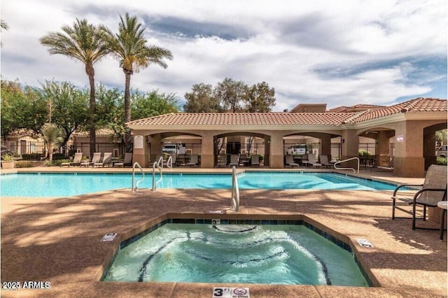 8245 E Bell Rd Unit 103, Scottsdale, AZ 85260 - community pool featuring a hot tub and a patio
