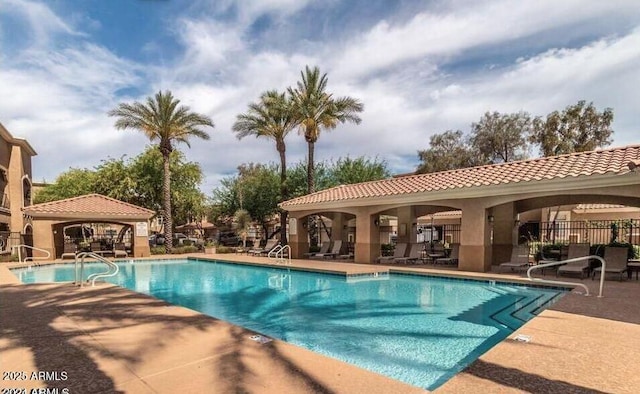 8245 E Bell Rd Unit 103, Scottsdale, AZ 85260 - community pool with a gazebo and a patio area