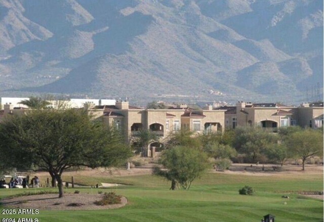 8245 E Bell Rd Unit 103, Scottsdale, AZ 85260 - view of property's community with a lawn and a mountain view