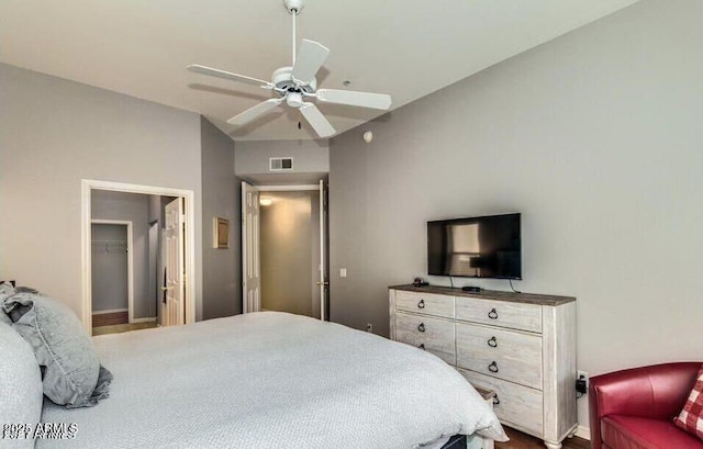 8245 E Bell Rd Unit 103, Scottsdale, AZ 85260 - bedroom featuring baseboards, ceiling fan, and a spacious closet
