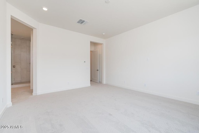 9775 S 36th Ln, Laveen, AZ 85339 - spare room with light carpet, baseboards, and recessed lighting