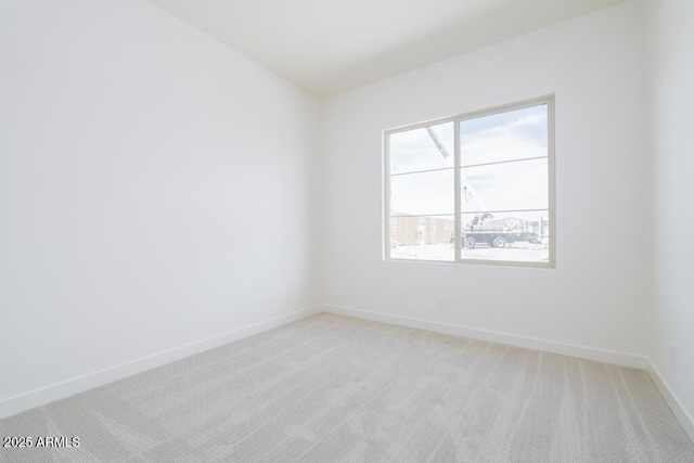 9775 S 36th Ln, Laveen, AZ 85339 - empty room featuring light carpet and baseboards