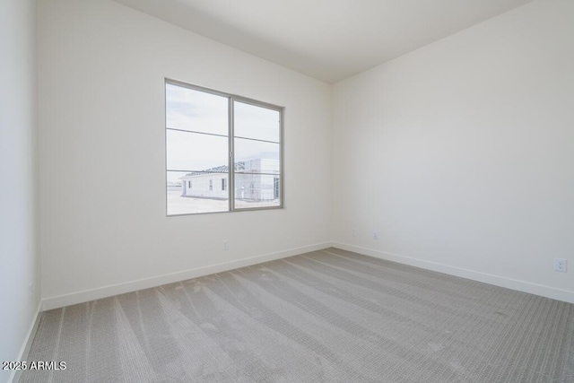 9775 S 36th Ln, Laveen, AZ 85339 - empty room with light carpet and baseboards