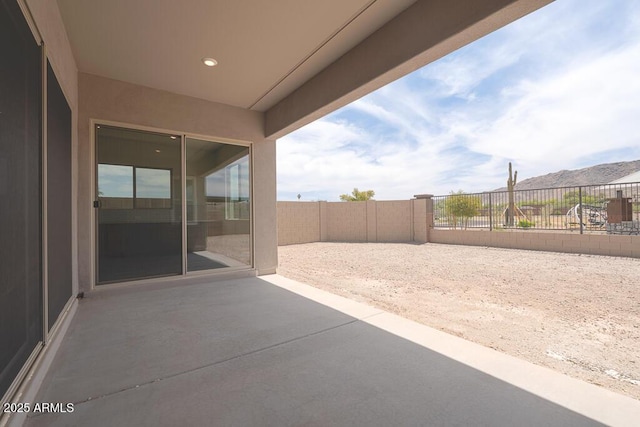 9775 S 36th Ln, Laveen, AZ 85339 - fenced backyard featuring a patio and a mountain view