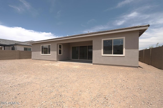 9775 S 36th Ln, Laveen, AZ 85339 - rear view of property featuring stucco siding and a fenced backyard