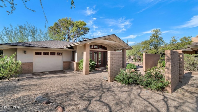 view of front of home with a garage