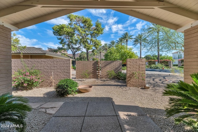 view of patio / terrace featuring ceiling fan