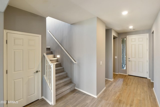 foyer entrance featuring light wood-type flooring