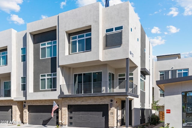 view of property featuring an attached garage