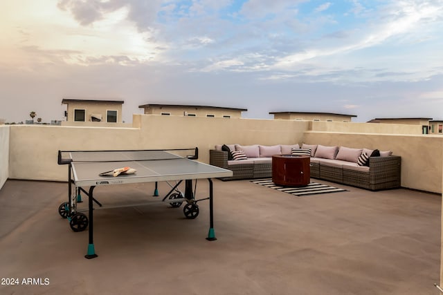 view of patio featuring fence and an outdoor living space